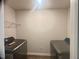 This laundry room features a washer and dryer at 50 Teal Dr, Youngsville, NC 27596