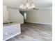 Open-concept living space with breakfast bar, seamlessly connecting kitchen and living areas at 50 Teal Dr, Youngsville, NC 27596