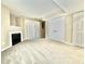 Finished basement with a cozy fireplace, sliding glass doors to the outside, and closet space at 5419 Vista View Ct, Raleigh, NC 27612
