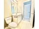 Clean and compact bathroom with a vanity, toilet, and doorway at 5419 Vista View Ct, Raleigh, NC 27612