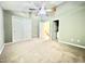 Neutral-toned bedroom featuring plush carpeting, and open door way at 5419 Vista View Ct, Raleigh, NC 27612