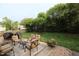 Inviting backyard patio with comfortable seating, perfect for outdoor relaxation and entertaining guests at 5456 Thunderidge Dr, Raleigh, NC 27610