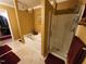 Spacious bathroom with a soaking tub and a separate glass-enclosed shower at 5456 Thunderidge Dr, Raleigh, NC 27610