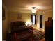 Comfortable bedroom with hardwood floors and a view into a walk-in closet at 5456 Thunderidge Dr, Raleigh, NC 27610