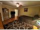 Cozy bedroom with hardwood floors, ceiling fan, and comfortable furnishings at 5456 Thunderidge Dr, Raleigh, NC 27610
