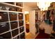 Well-organized walk-in closet with custom shelving and hanging space at 5456 Thunderidge Dr, Raleigh, NC 27610