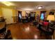 Formal dining room with hardwood floors, chandelier, and elegant decor, perfect for entertaining and gatherings at 5456 Thunderidge Dr, Raleigh, NC 27610