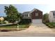Charming two-story home with a well-manicured front yard and inviting curb appeal at 5456 Thunderidge Dr, Raleigh, NC 27610