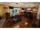 Traditional eat-in kitchen with wood cabinets, stainless appliances, and sliding glass doors to the backyard at 5456 Thunderidge Dr, Raleigh, NC 27610