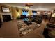 Spacious living room featuring a fireplace, comfortable seating, and carpeted floors, creating a cozy atmosphere at 5456 Thunderidge Dr, Raleigh, NC 27610