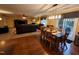 Open concept floor plan featuring living room and dining room with wood floors and neutral colors at 5456 Thunderidge Dr, Raleigh, NC 27610