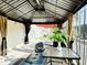 Backyard featuring a patio with furniture and a BBQ grill at 5849 Ricker Rd, Raleigh, NC 27610