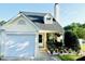 Charming one-story home featuring a well-manicured lawn and attached one car garage at 5849 Ricker Rd, Raleigh, NC 27610