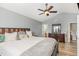 Bedroom featuring a comfy bed, a dresser and a ceiling fan at 5849 Ricker Rd, Raleigh, NC 27610