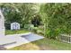 The backyard features a shed, seating area, and well-manicured landscaping, offering a private outdoor space at 709 Brighton Rd, Raleigh, NC 27610