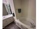 Bathroom with vanity and jacuzzi tub at 7194 Johns Point Ct, Liberty, NC 27298