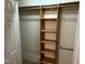 Walk in closet with shelves and hanging space at 7194 Johns Point Ct, Liberty, NC 27298