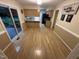 Dining area featuring hardwood floors, natural light, and neutral paint at 7194 Johns Point Ct, Liberty, NC 27298