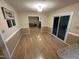 Dining area featuring hardwood floors and sliding glass doors with access to outdoor space at 7194 Johns Point Ct, Liberty, NC 27298