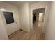 Entryway featuring hardwood floors, neutral paint, and a front door with decorative glass at 7194 Johns Point Ct, Liberty, NC 27298