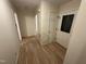 Entryway featuring hardwood floors, neutral paint, and a front door with glass detail at 7194 Johns Point Ct, Liberty, NC 27298