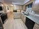Kitchen with stainless steel appliances, black dishwasher, and granite countertops at 7194 Johns Point Ct, Liberty, NC 27298