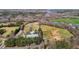 Expansive property featuring horse facilities, a barn, pasture land, and lush surrounding trees at 756 Epps Clark Rd, Siler City, NC 27344