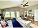 Comfortable primary bedroom boasts a window bench and sitting area at 756 Epps Clark Rd, Siler City, NC 27344