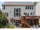 Expansive backyard deck and patio featuring multi-level outdoor living and dining areas, perfect for entertaining and relaxation at 8106 Sommerwell St, Raleigh, NC 27613