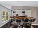 Entertainment space with a bar, seating, and ample lighting, perfect for hosting guests at 8106 Sommerwell St, Raleigh, NC 27613