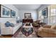 Inviting living room with hardwood floors, classic furniture, and natural light creating a relaxing space at 8106 Sommerwell St, Raleigh, NC 27613