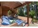 Shaded deck with comfortable seating, serene outdoor space, and picturesque views of the surrounding landscape at 8106 Sommerwell St, Raleigh, NC 27613