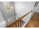 Bright foyer with a staircase leading to the second floor at 8106 Sommerwell St, Raleigh, NC 27613