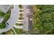 Aerial view of multi-unit complex with mature landscaping and parking area at 927 Contessa Dr, Cary, NC 27513
