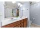 Well-lit bathroom featuring double sinks with a view into the soaking tub at 927 Contessa Dr, Cary, NC 27513