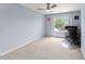 A well lit bedroom with carpet and a ceiling fan at 927 Contessa Dr, Cary, NC 27513