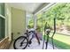 Enclosed patio area perfect for relaxing with an exercise machine and bike at 927 Contessa Dr, Cary, NC 27513