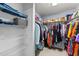Spacious walk-in closet with shelving and hanging space to maximize storage capacity at 927 Contessa Dr, Cary, NC 27513