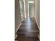 Welcoming entryway featuring luxury vinyl plank flooring and white doors at 0416 Hazy Hls Ln, Garner, NC 27529