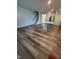 Spacious living room featuring an open floor plan and stairs to second level at 0416 Hazy Hls Ln, Garner, NC 27529