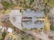 Aerial view of the home showing roof, parking, and surroundings at 100 Edenburgh Rd # 202, Raleigh, NC 27608