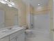 Neutral tiled bathroom with shower-tub combo and updated sink at 100 Edenburgh Rd # 202, Raleigh, NC 27608