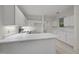 Kitchen featuring white cabinets and countertops at 100 Edenburgh Rd # 202, Raleigh, NC 27608