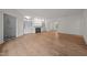 Bright living room with a fireplace, built-in shelving, and hardwood floors at 100 Edenburgh Rd # 202, Raleigh, NC 27608