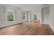 Bright and airy living room with hardwood floors and large windows at 100 Edenburgh Rd # 202, Raleigh, NC 27608