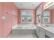 Primary bathroom featuring a soaking tub and vanity at 100 Edenburgh Rd # 202, Raleigh, NC 27608