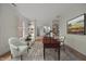 Bright home office with built-in shelving and ample natural light at 100 Edenburgh Rd # 202, Raleigh, NC 27608