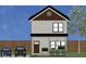 Charming two-story home with a welcoming front porch and well-maintained landscaping. Cars in driveway at 1009 Ridge Rock Rd, Raleigh, NC 27610
