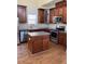 Well-equipped kitchen with stainless steel appliances and a functional center island at 108 Bally Shannon Way, Apex, NC 27539
