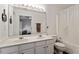 Bathroom featuring a double sink vanity, large mirror and toilet with a shower/tub combo at 110 Great Ridge Ct, Morrisville, NC 27560